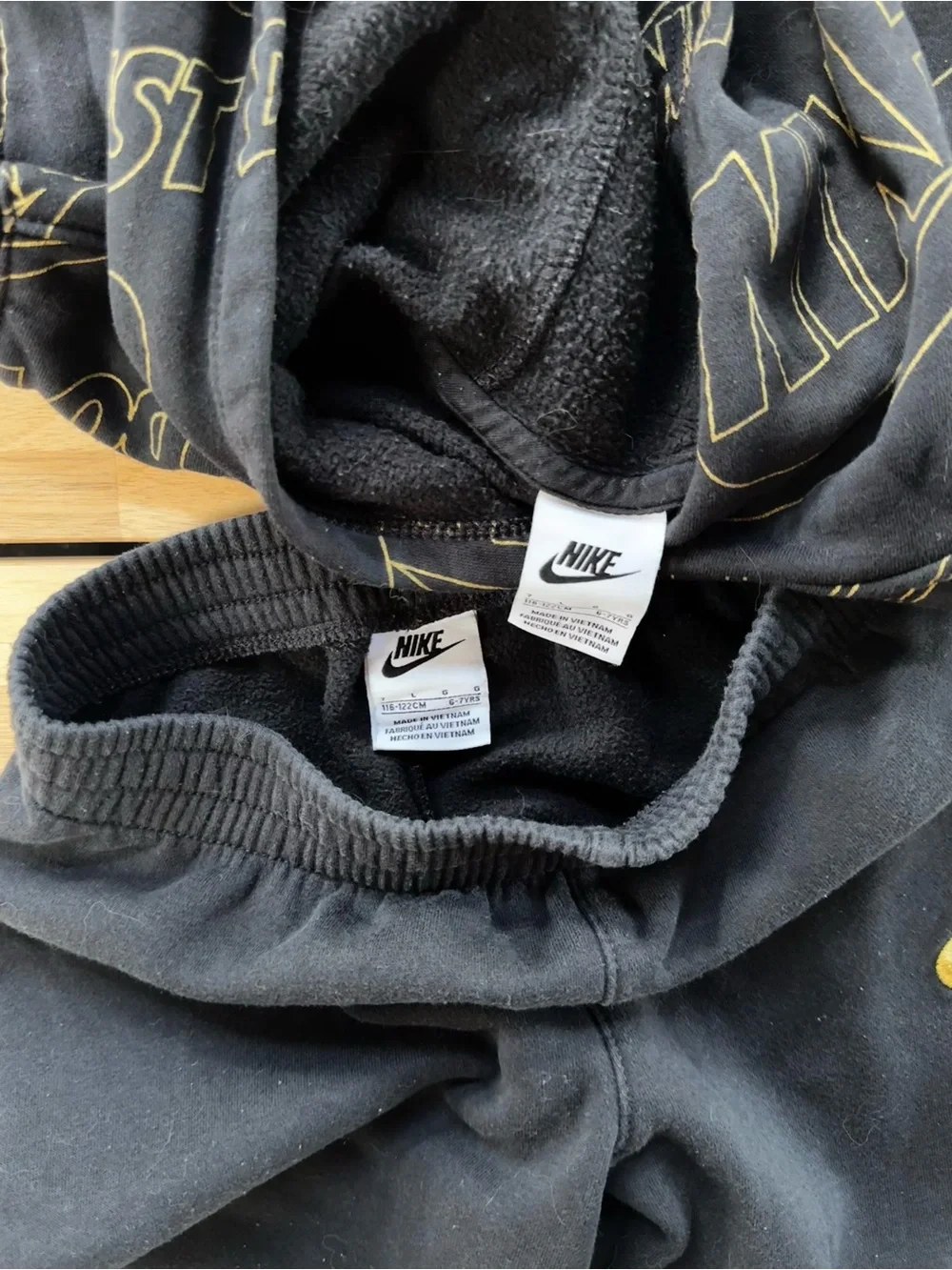 Nike Black Kids Hoodie and Jogger Set with Gold Logo Accents
